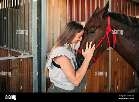 teen fucked by horse|Teenage Girl Taking Care of Horse in Stable